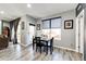 Charming dining area with a table and four chairs near a window at 17725 E 99Th Ave, Commerce City, CO 80022