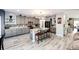 Modern kitchen with granite countertops and gray cabinets at 17725 E 99Th Ave, Commerce City, CO 80022