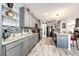 Modern kitchen with gray cabinets and granite countertops at 17725 E 99Th Ave, Commerce City, CO 80022