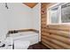 Main bathroom with a jetted bathtub and toilet at 721 Aspen Way, Evergreen, CO 80439