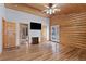 Main bedroom with hardwood floors and ensuite bathroom at 721 Aspen Way, Evergreen, CO 80439