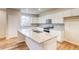Modern kitchen with stainless steel appliances, granite countertops and island at 23981 E 40Th Ave, Aurora, CO 80019