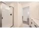 Modern bathroom featuring a glass-enclosed shower, sleek fixtures, and clean design for a spa-like experience at 348 N Geneva St, Aurora, CO 80010