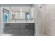 Spa-like bathroom with double vanity and large walk-in shower at 4600 W Princeton Ave, Denver, CO 80236