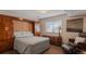 Guest bedroom with built-in storage and comfortable seating at 4600 W Princeton Ave, Denver, CO 80236