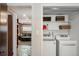 Convenient laundry area with washer, dryer and storage at 4600 W Princeton Ave, Denver, CO 80236