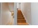 Wooden staircase leading to upper levels of the home at 4600 W Princeton Ave, Denver, CO 80236