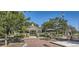 Community park featuring a gazebo, mature trees, walkways, and seating areas at 11008 Snowdon St, Parker, CO 80134