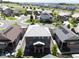 Bird's eye view of a well-maintained home with a fenced yard in a suburban neighborhood at 7720 S Queensburg Way, Aurora, CO 80016