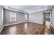 Spacious bedroom featuring hardwood floors and great natural light; perfect blank canvas at 7720 S Queensburg Way, Aurora, CO 80016
