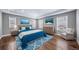Beautiful main bedroom with a trey ceiling, lots of natural light and neutral decor at 7720 S Queensburg Way, Aurora, CO 80016
