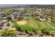 Beautiful aerial view of park, nearby townhomes, and surrounding neighborhood with mature trees at 1615 Harlan St # 2, Lakewood, CO 80214