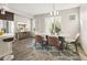 Modern dining room features a stylish table setting and contemporary decor at 1615 Harlan St # 2, Lakewood, CO 80214