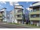 Contemporary townhome with eye-catching mixed materials and stylish architectural details at 1615 Harlan St # 2, Lakewood, CO 80214