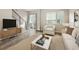 Bright living room with modern decor, including sleek furniture and stylish accents at 1615 Harlan St # 2, Lakewood, CO 80214