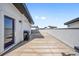 Spacious rooftop deck is perfect for outdoor entertaining; features gas grill for cooking at 1615 Harlan St # 2, Lakewood, CO 80214