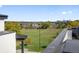 Gorgeous view of nearby park, lake, and downtown from this townhome's rooftop deck at 1615 Harlan St # 2, Lakewood, CO 80214