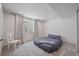 Cozy bedroom featuring soft gray carpet, neutral paint and natural light at 1100 Blue Bell Rd, Berthoud, CO 80513