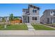 Charming two-story home featuring gray siding, stone accents, a well-maintained lawn, and inviting curb appeal at 1100 Blue Bell Rd, Berthoud, CO 80513