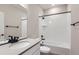 Bathroom featuring vanity sink, a shower-tub combination and white subway tile at 4102 Estrella St, Brighton, CO 80601