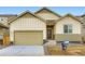 Charming single Gathering home featuring a two-car garage and neutral-toned exterior at 4102 Estrella St, Brighton, CO 80601