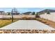 Enjoy outdoor recreation on this home's backyard basketball court, complemented by landscaped surroundings at 5839 Hay Market Trl, Parker, CO 80134