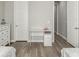 Bright bedroom with a white desk and a pair of beds at 5839 Hay Market Trl, Parker, CO 80134