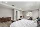 Spacious main bedroom with a fireplace, recessed lighting, and neutral decor at 5839 Hay Market Trl, Parker, CO 80134