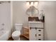 Stylish bathroom boasts a sleek vanity with modern fixtures, complemented by elegant tile work for a spa-like experience at 8500 E Jefferson Ave # 11C, Denver, CO 80237