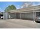 Designated carport parking area with numbered spaces for residents' convenience at 8500 E Jefferson Ave # 11C, Denver, CO 80237
