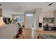 Open-concept living area with seamless transitions, featuring an inviting atmosphere and abundant natural light at 8500 E Jefferson Ave # 11C, Denver, CO 80237