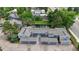 Aerial view of the townhomes, surrounded by mature trees and a tranquil pond at 2856 S Kenton Ct, Aurora, CO 80014
