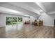 Expansive basement area with sliding glass doors to the backyard, ample natural light, and neutral decor at 2856 S Kenton Ct, Aurora, CO 80014