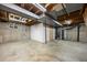 An unfinished basement space with concrete walls and floors offering a blank canvas for customization at 2856 S Kenton Ct, Aurora, CO 80014
