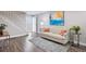 Inviting living room featuring modern decor, hardwood floors, and staircase at 2856 S Kenton Ct, Aurora, CO 80014