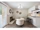 Spacious living area with fireplace, eat-in kitchen with breakfast bar, and outside access at 2856 S Kenton Ct, Aurora, CO 80014