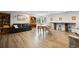 The living room has vinyl floors, comfortable seating, and shelving at 2856 S Kenton Ct, Aurora, CO 80014