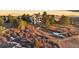 Aerial view of the property and home, including fencing, landscaping, and outdoor event space at 7645 Fox Creek Trl, Franktown, CO 80116