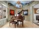 Charming piano room featuring a mural, grand piano, and natural light at 7645 Fox Creek Trl, Franktown, CO 80116