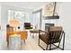 Cozy living room featuring a fireplace, comfortable seating, and abundant natural light at 180 S Nome St, Aurora, CO 80012