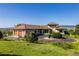 Beautiful home with a circular driveway, three-car garage, and stunning mountain views at 8611 Coachlight Way, Littleton, CO 80125