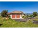 Home with three-car garage, well-maintained landscaping and a circular driveway at 8611 Coachlight Way, Littleton, CO 80125
