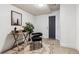 Cozy basement area with an oriental rug and a desk, perfect for office at 409 Terry St # D, Longmont, CO 80501