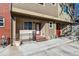 Inviting entrance with a red door, well-kept landscaping, and convenient access at 409 Terry St # D, Longmont, CO 80501