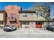 Attractive townhome featuring neutral siding, well-maintained landscaping, and convenient parking at 409 Terry St # D, Longmont, CO 80501