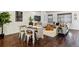 Inviting living room and dining area with hardwood floors, comfortable seating, and bright natural light at 409 Terry St # D, Longmont, CO 80501