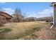 Large grassy backyard offering plenty of space for outdoor activities and enjoyment at 9080 Fig St, Arvada, CO 80005