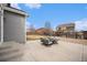 Back patio with outdoor seating area, perfect for entertaining and relaxation at 9080 Fig St, Arvada, CO 80005