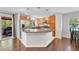 Updated kitchen with granite countertops, stainless appliances, and access to outdoor deck at 8032 Lee Ct, Arvada, CO 80005