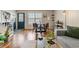 Inviting dining area with hardwood floors, stylish decor, and ample natural light at 338 Pheasant Run, Louisville, CO 80027